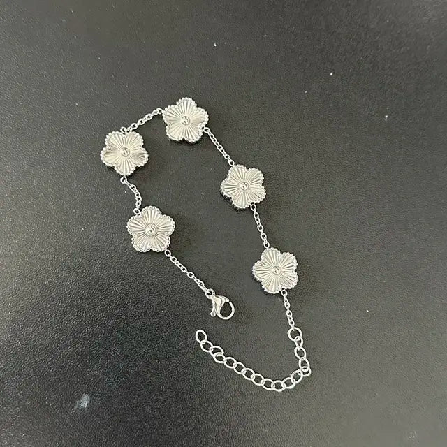 Fleur de Lumière Bracelet and Earrings